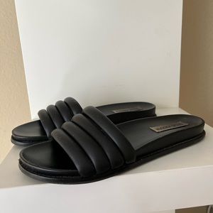 Black leather Steve Madden slides
